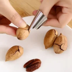 Køkkenværktøj Fingerbeskytter Rustfrit stål Fingerbeskytter Tommelfingerbeskytter Skræller Afskalning af bønnenøddeskaller Undgå at gøre ondt Sale