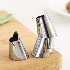 Køkkenværktøj Fingerbeskytter Rustfrit stål Fingerbeskytter Tommelfingerbeskytter Skræller Afskalning af bønnenøddeskaller Undgå at gøre ondt Sale