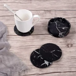 6-pakning Reversible Glass Pads Black Marble Pu med Holder Best