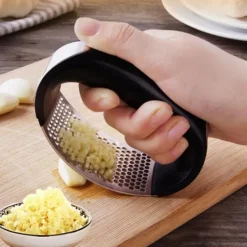 Hvidløgspressere>Vitlökspress i Rostfritt stål